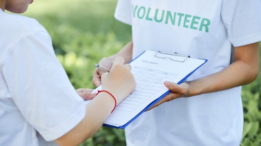 nonprofit volunteer with clipboard